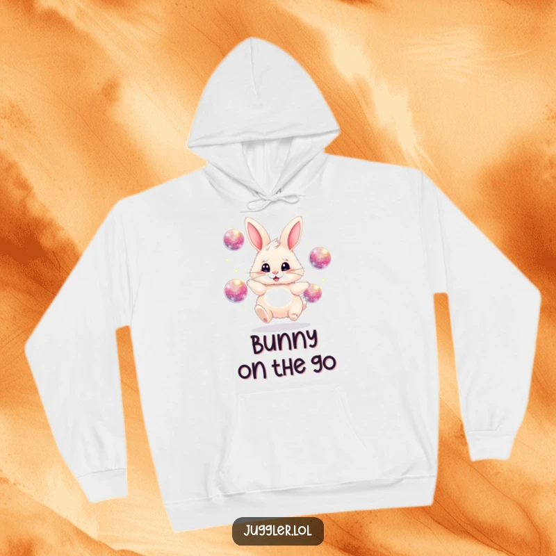 Funny juggling bunny hoodie, fluffy, frantically juggling sparkly balls, cozy and humorous attire, amazing funny gift.